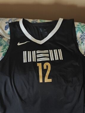 Nike Black Basketball Jersey with Gold Number 12